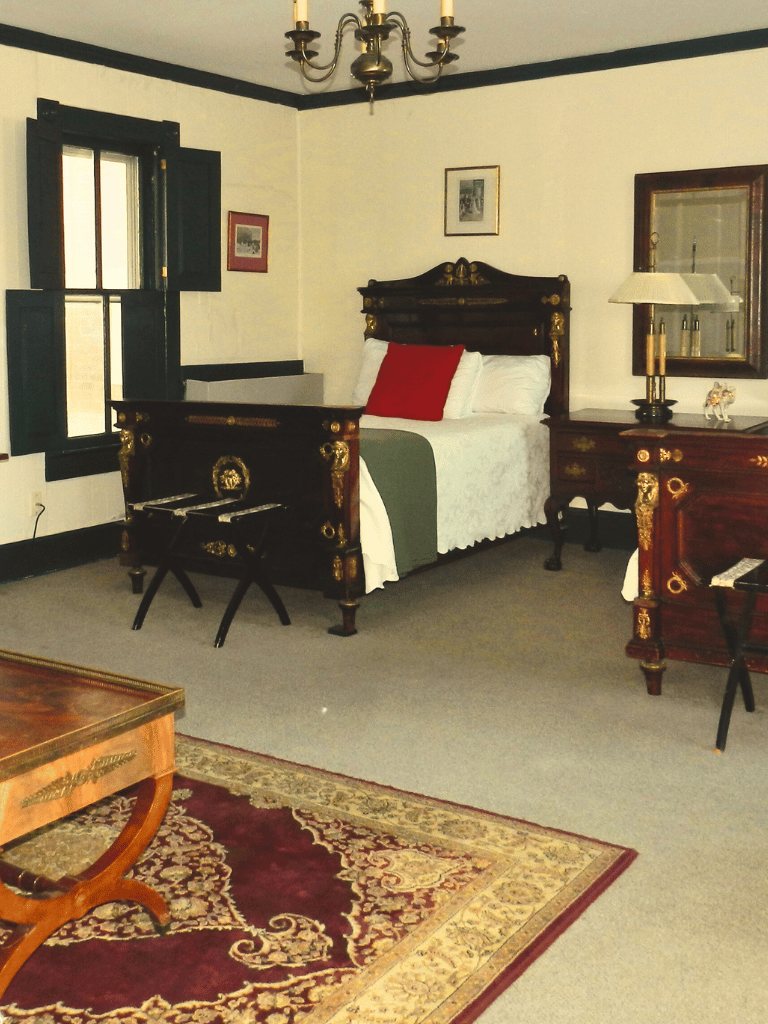 Two vintage 3/4 beds in the Rutherford Room (Room 20) at The Historic Wayside Inn 1797 in Middletown, VA, with a full private bath.